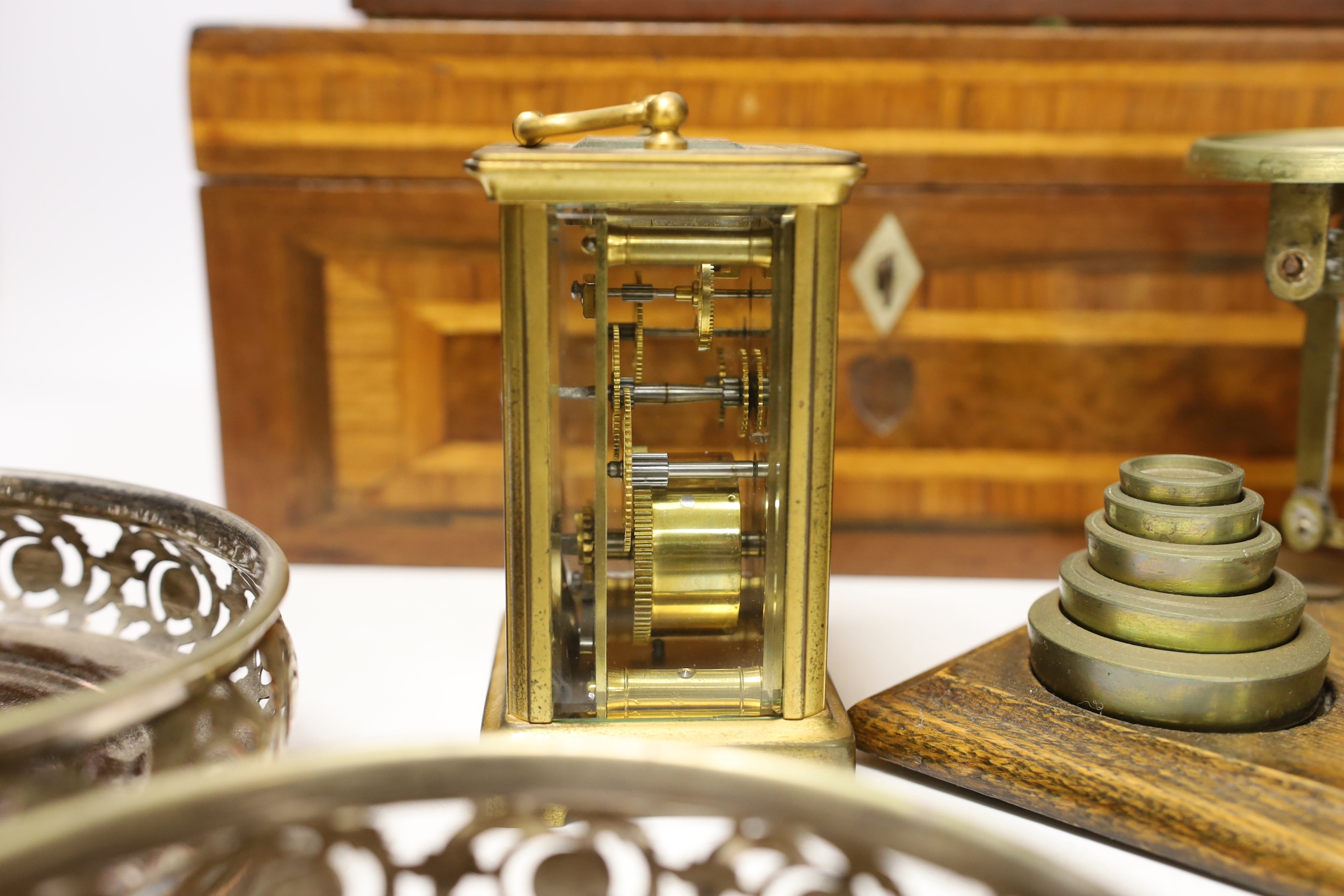 Letter scales and weights, a inlaid box, a carved box, a pair of plated coasters, carriage clock, inlaid box 33cm wide x 13cm high